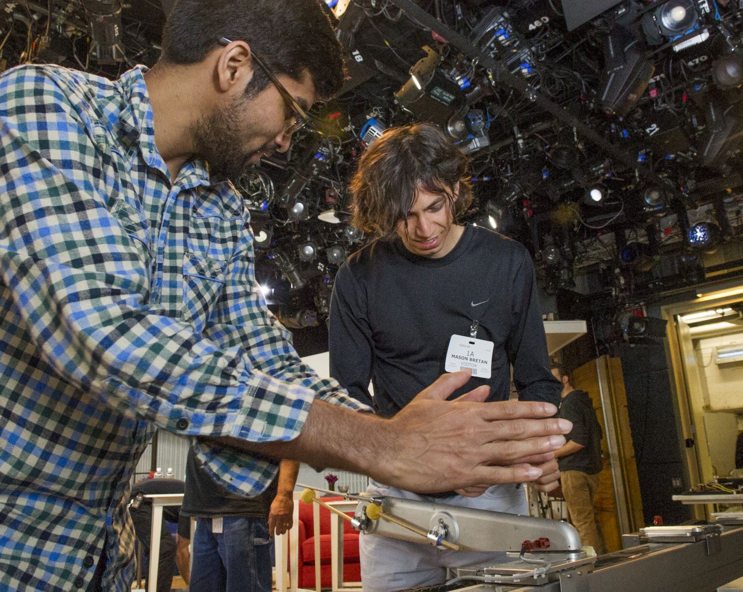 Mason Bretan and Deepak Gopinath assemble Shimon's arm.