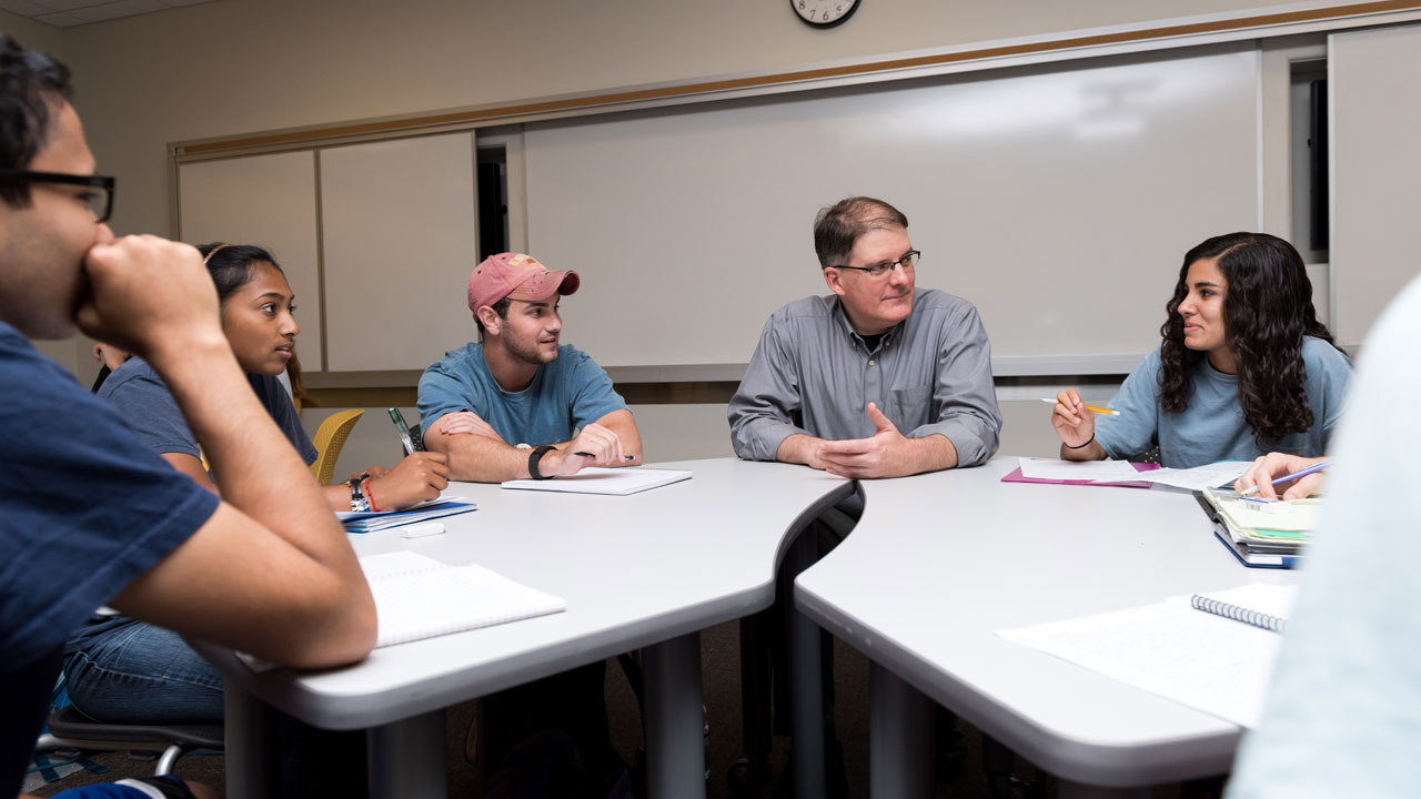 photo - Bob Kirkman and students in class