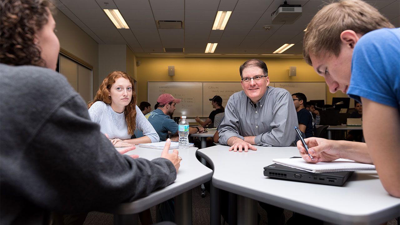 photo - Bob Kirkman and students in class