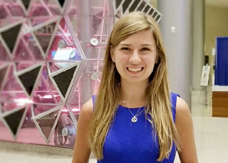 Portrait of student with sustainability award