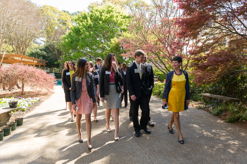 Val Peterson walking with students