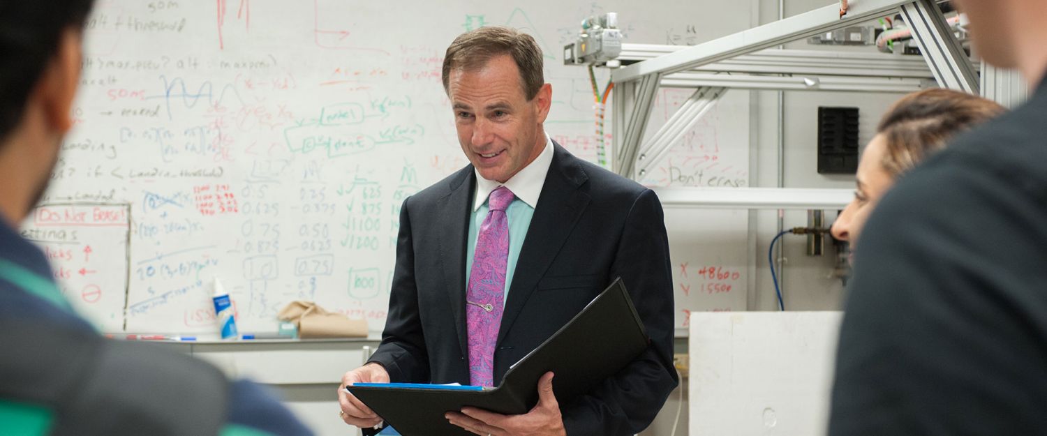 Bill Singhose with students