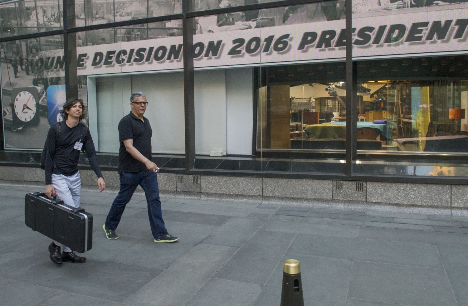 Gil and Mason walking out of the Today Show studio