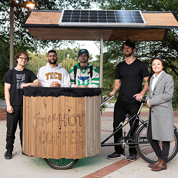 students with coffee bike