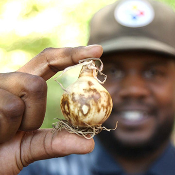 DJ Jordan holds a bulb