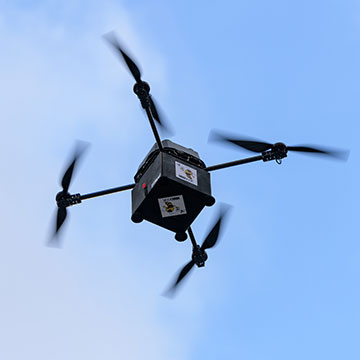 A drone with a large cargo area for carrying books