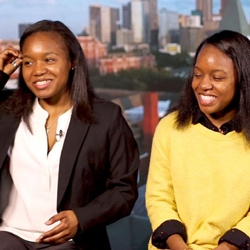 Marquetta and Marteisha Griffin in front of the Georgia Tech and Atlanta skyline