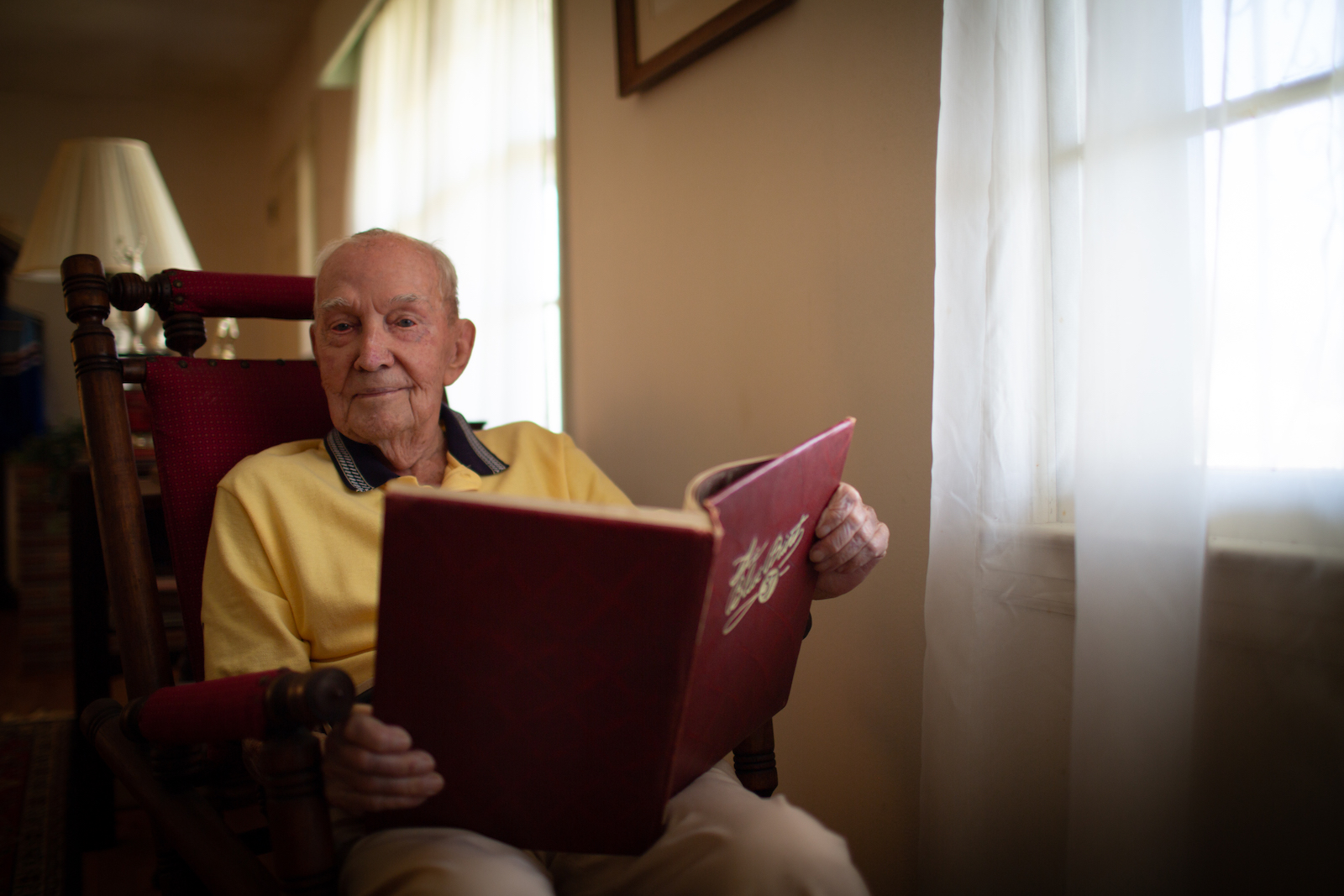 George "Roy" Bethune holding his Georgia Tech yearbook