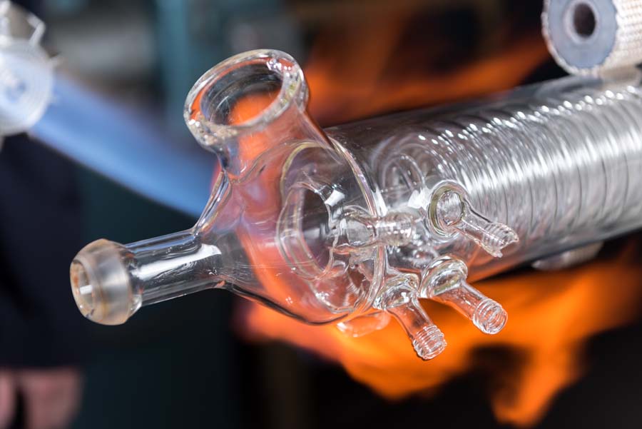 This coil condenser has a broken ball joint that needs to have a new ground glass joint sealed onto it.