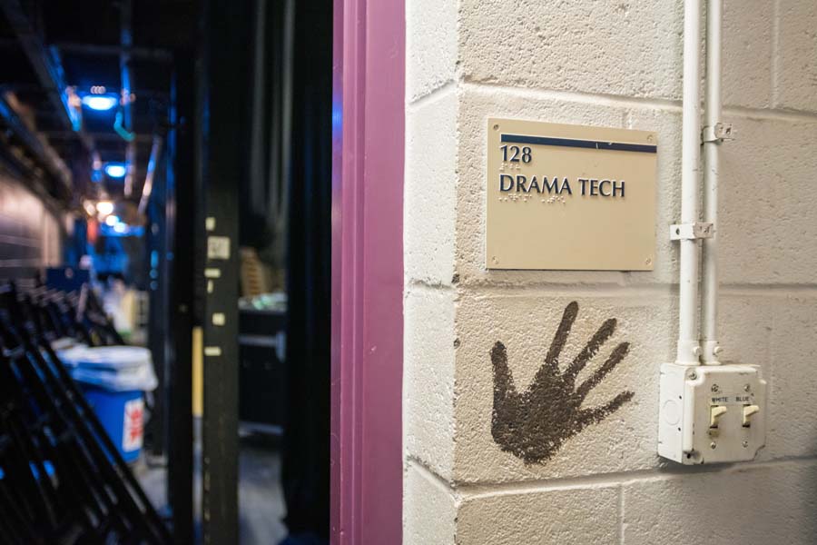 Before going onstage, performers touch former DramaTech Director Greg Abbott’s handprint for luck.