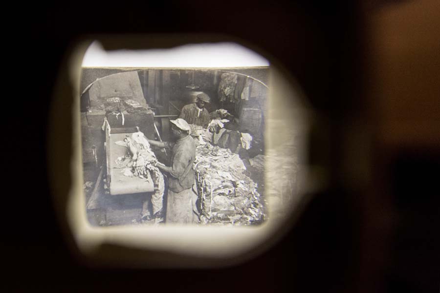 Archival photos provide insights into the early days of papermaking factories.