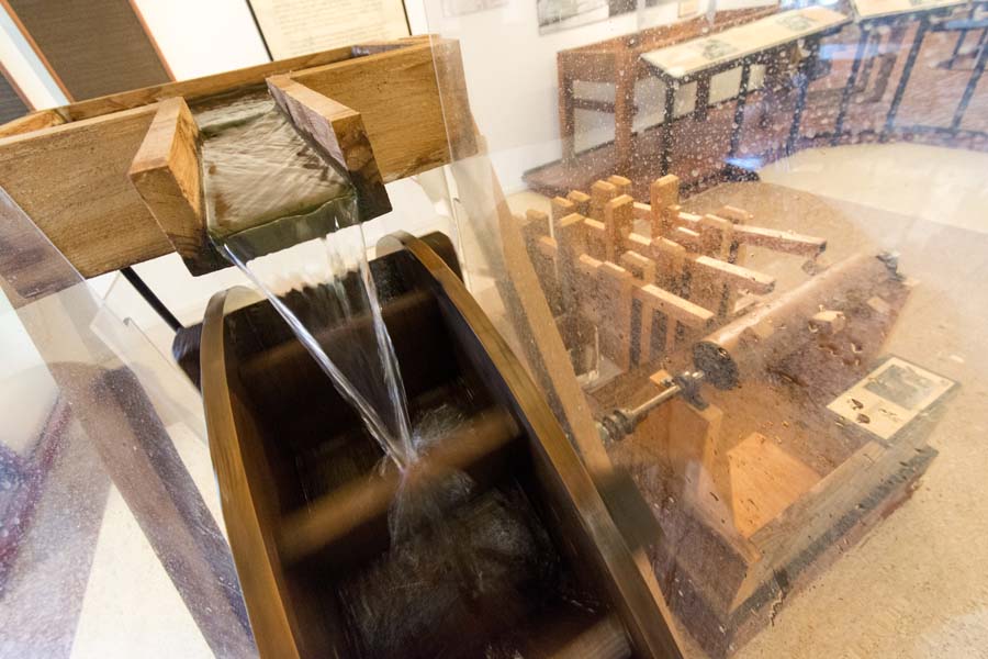 Waterwheels were used to grind rags into pulp for papermaking. This model is part of the education center.