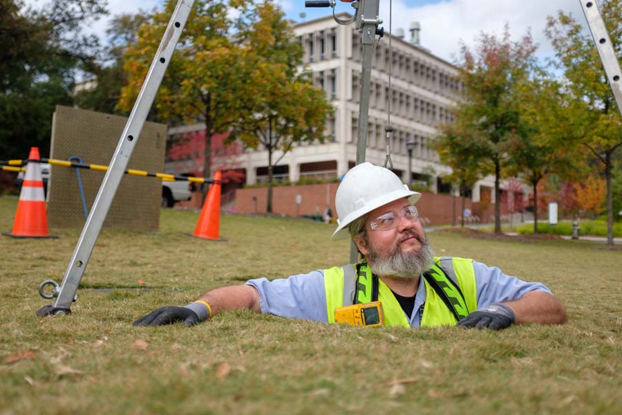 When entering the reservoir, Billy Baxter carries a carbon monoxide monitor and wears protective gear including a safety harness.