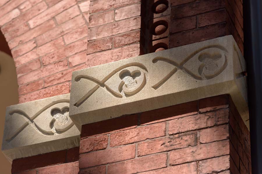 On the Tech Tower porch, the arch design includes fish with a clover pattern, a religious connotation. There used to be a chapel in the Tower.