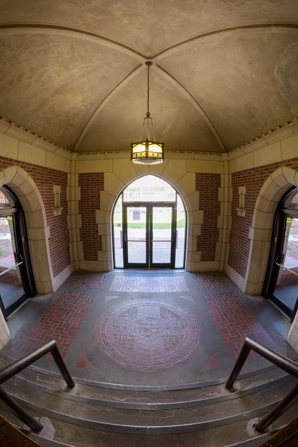 The entry of Brittain Dining Hall has a terra-cotta seal of Georgia School of Technology on the floor.