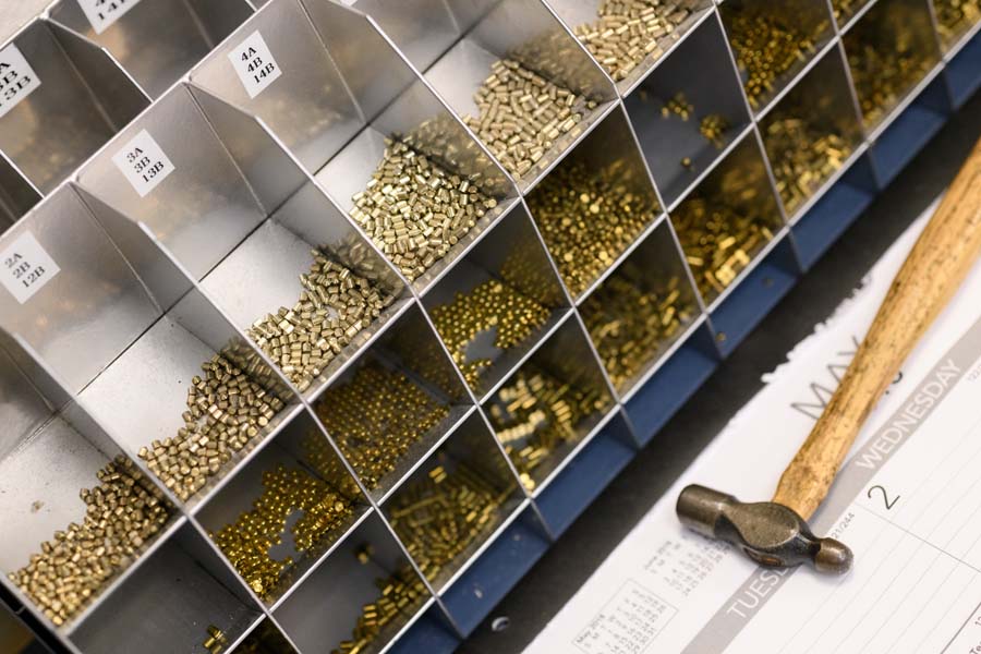 Pin segments, used in lock cores, are stored in small bins.