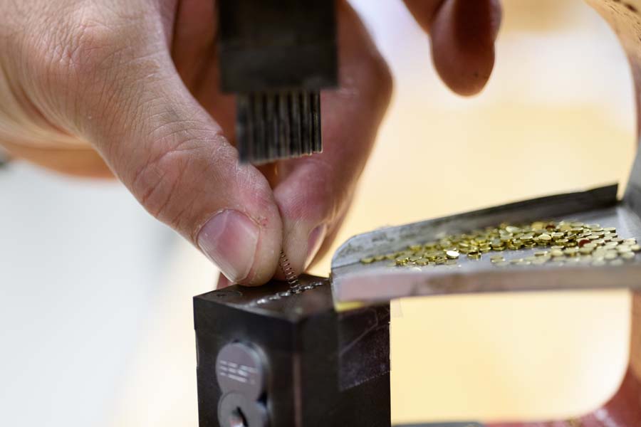 Capping a lock core after inserting the spring.