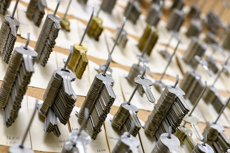 Wall of key blanks for cabinets and desks.