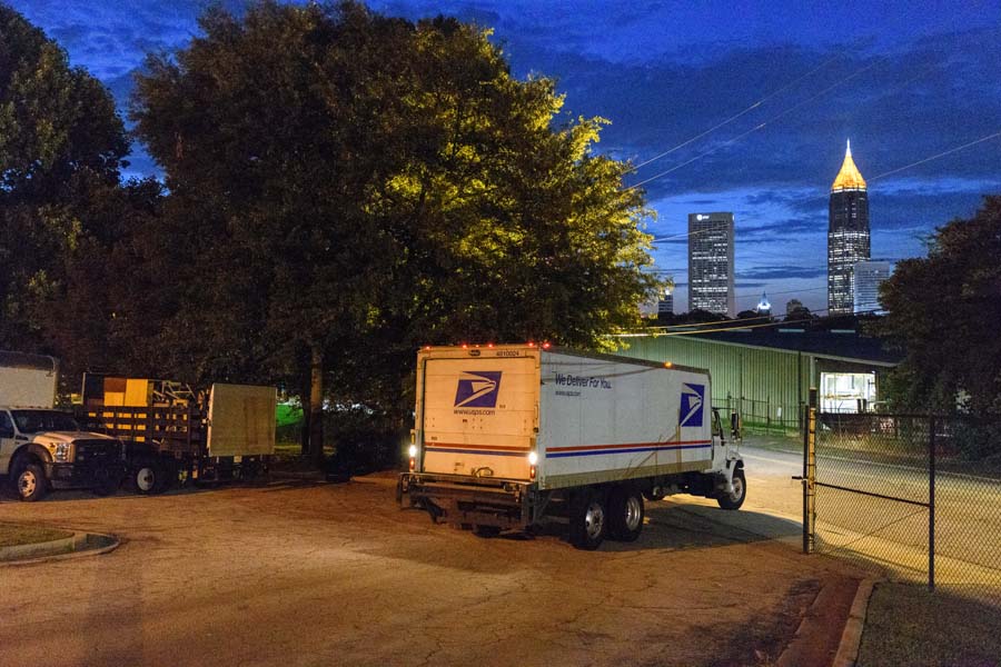 The U.S. Postal Service truck delivers mail from Atlanta’s Crown Road post office to the Georgia Tech loading dock on Marietta Street.