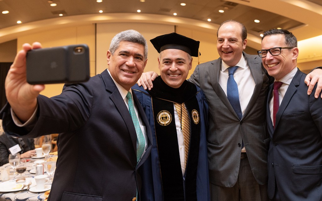 President Cabrera visits with guests at breakfast the morning of Investiture.