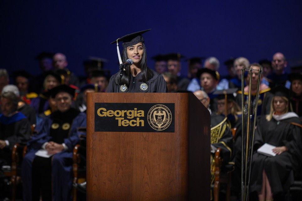 Pooja Juvekar, president of the undergraduate Student Government Association, addresses attendees.