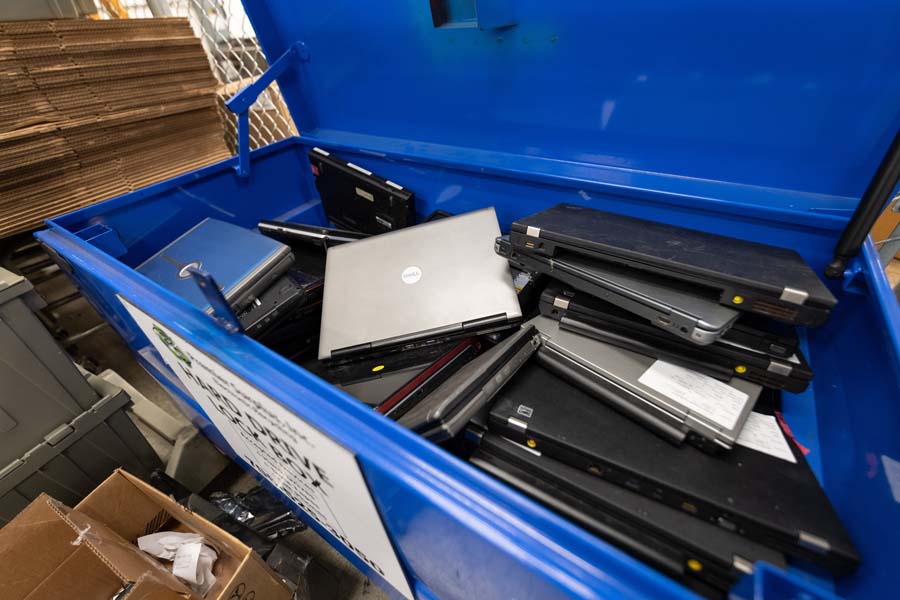 Surplus hard drives, further secured in a lockbox inside the cage, are shipped offsite to be destroyed by a state-approved recycling vendor.