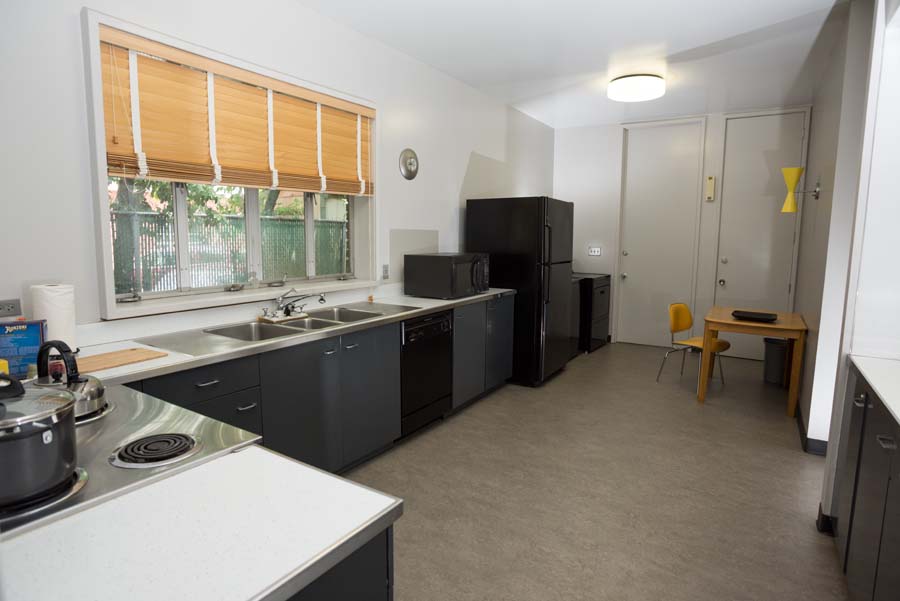 Heffernan House master bedroom. All windows in the house have Venetian blinds or frosted glass for privacy, eliminating the need for draperies.