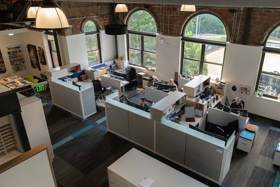 The office space for the Interior Design Department has high ceilings and is filled with light.