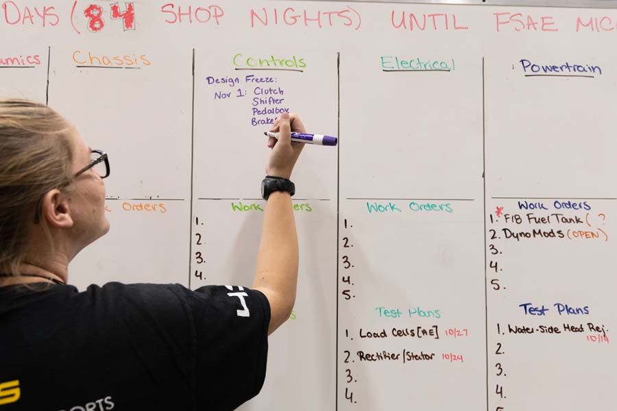 Dani Adamson, a fourth-year mechanical engineering major, works on GT Motorsports’ project management plan.