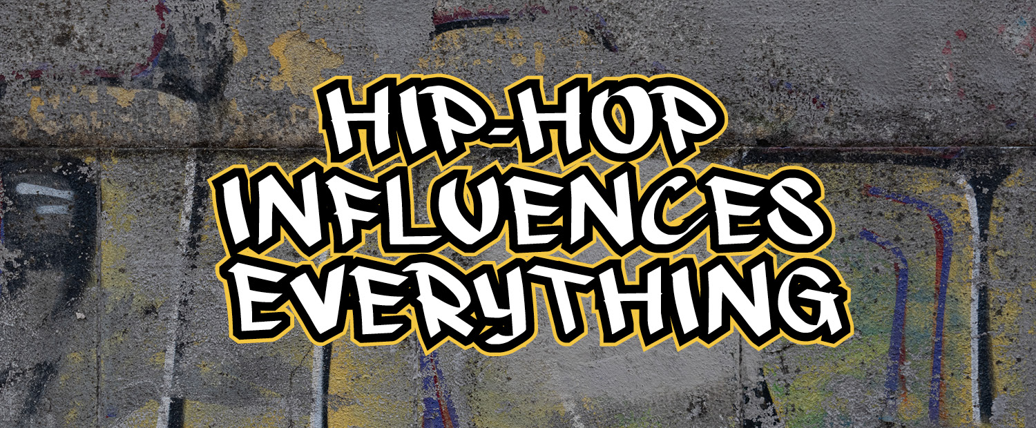 “Hip-hop influences everything” in graffiti-inspired font on a gray brick wall with splashes of gold to set up explanation of trap rap, who started hip hop, where did hip hop come from, how hip hop started, hip hop influence, when did hip hop start, earsketch, how old is hip hop, hip hop history, hip hop influences, hip hop, how hip hop influences culture, what is hip hop, what is trap rap.
