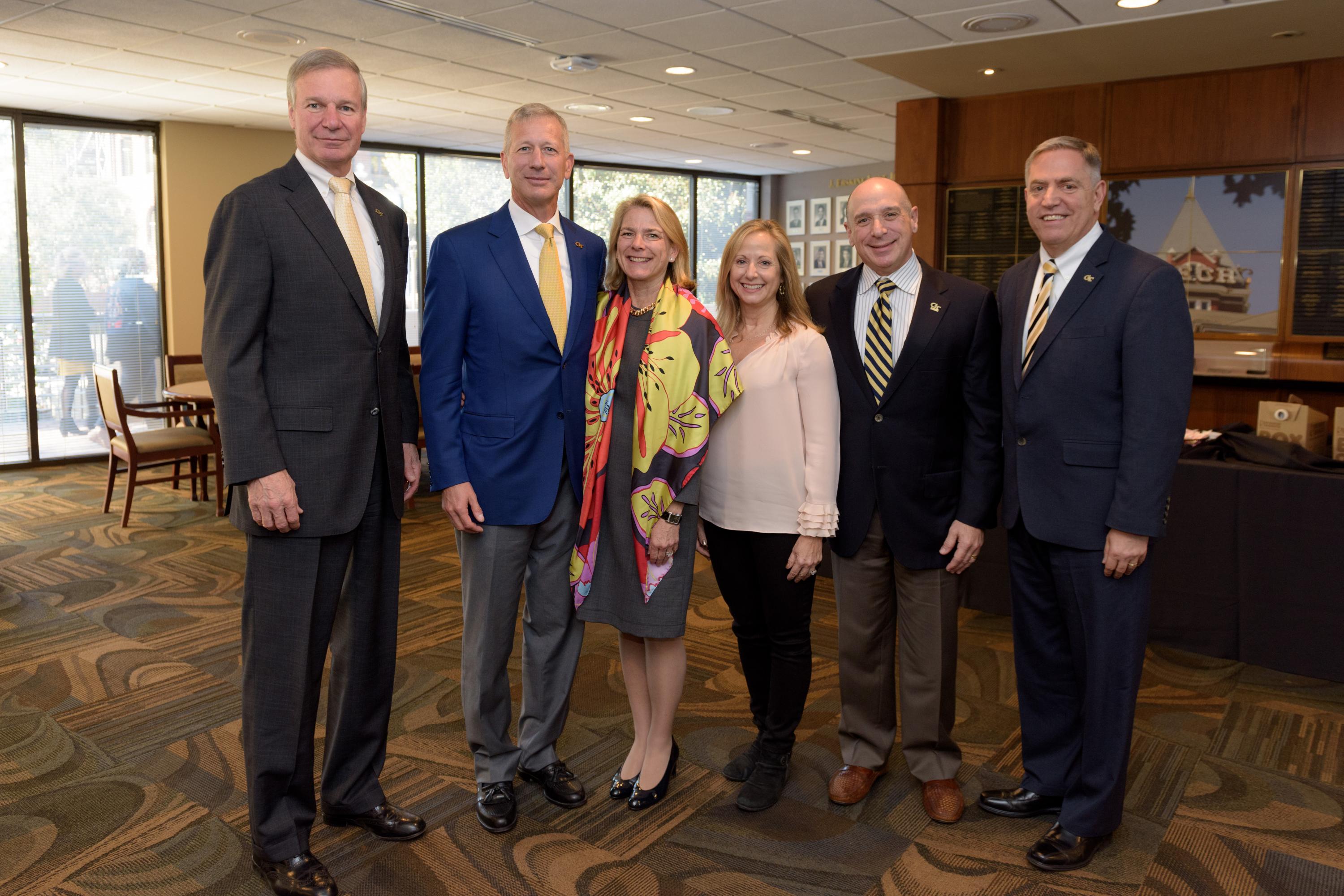Current parents Lance and Julie Fritz of Omaha, Nebraska, and Darlene and Eric Brandt of Corona Del Mar, California, with President G.P. “Bud” Peterson (left) and Dean of Students John Stein (right), make history at the Oct. 27 Parent’s Board meeting.