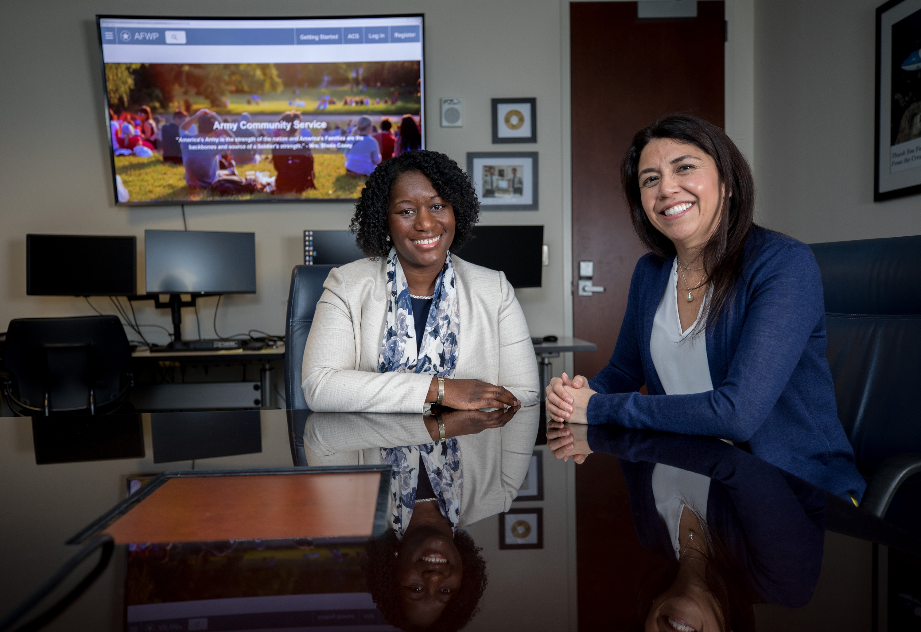 GTRI Senior Research Scientist Sheila Isbell and Senior Research Associate Margarita Gonzalez are helping the Army Community Service program revamp information systems used to provide an array of social services to the families of soldiers. (Credit: Branden Camp, Georgia Tech)