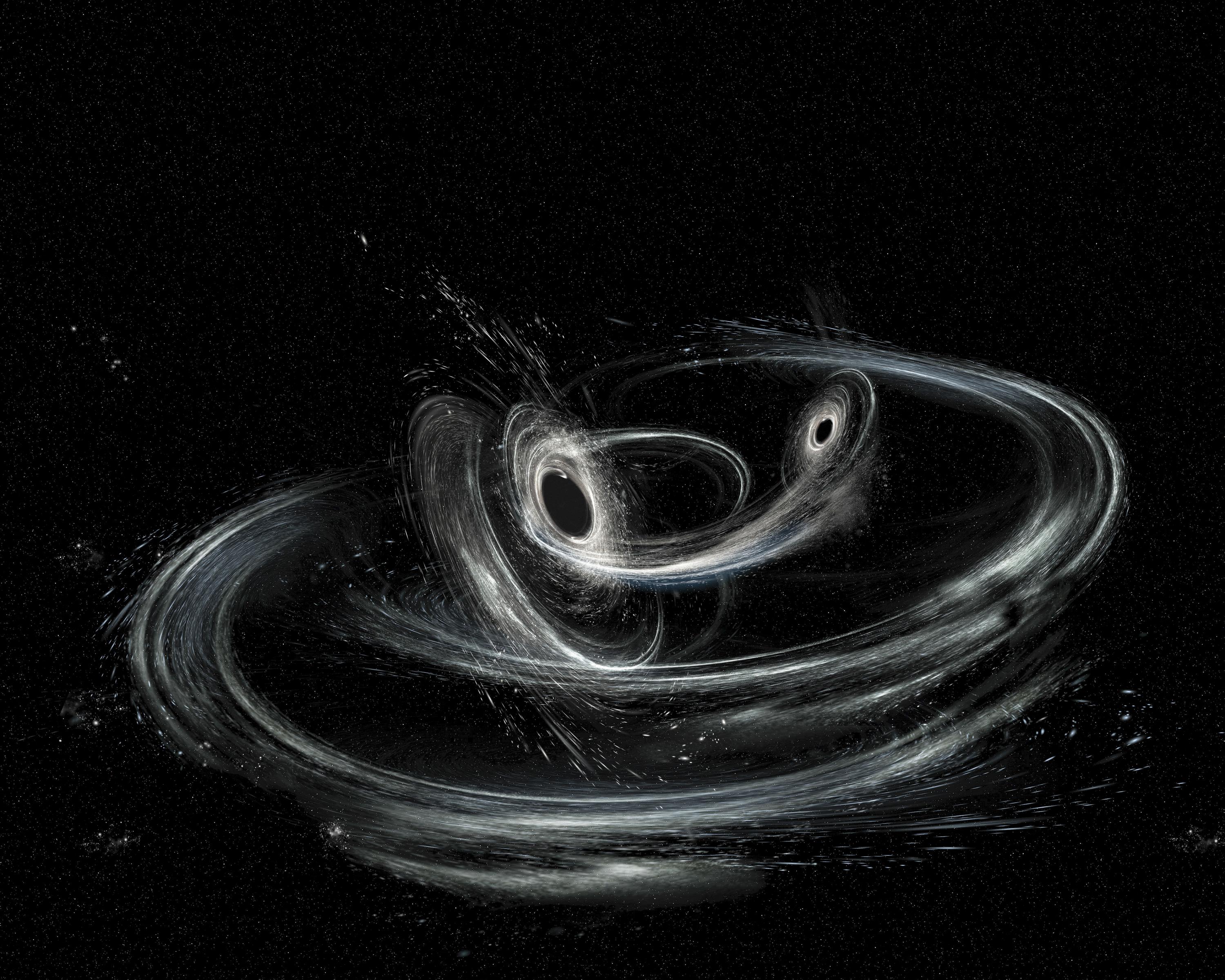 Artist's conception shows two merging black holes similar to those detected by LIGO. The black holes—which will ultimately spiral together into one larger black hole—are illustrated to be orbiting one another in a plane. The black holes are spinning in a non-aligned fashion, which means they have different orientations relative to the overall orbital motion of the pair. There is a hint of this phenomenon found by LIGO in at least one black hole of the GW170104 system. [Image credit: LIGO/Caltech/MIT/Son