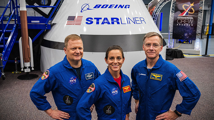 Eric Boe (left) will fly with Nicole Mann and Chris Ferguson in the Starliner capsule sometime in 2019