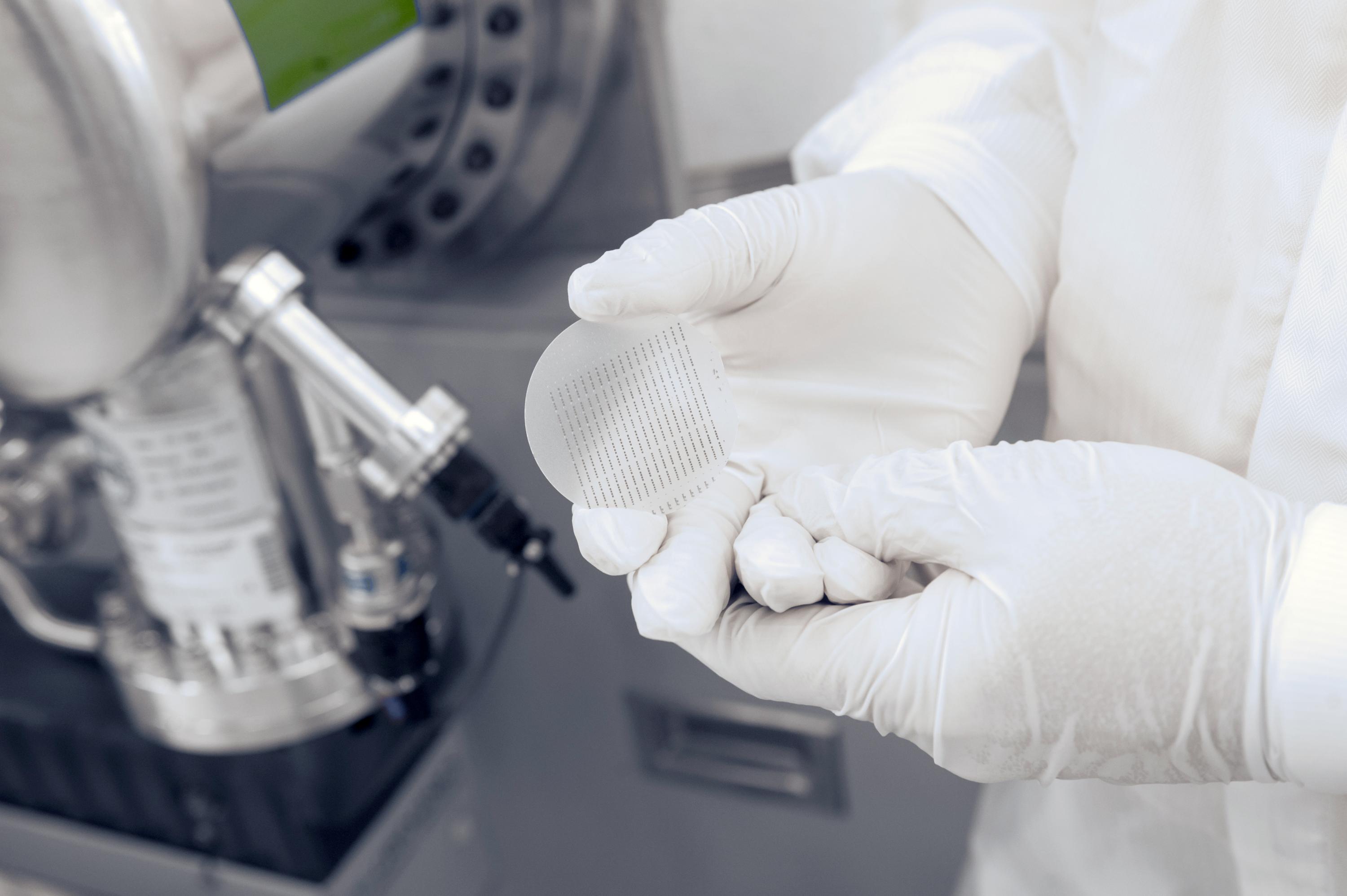 Professor Alan Doolittle holds an example of advanced computing nanomaterials in his hands in the clean room inside Georgia Tech's Marcus Nanotechnology Building. Credit: Georgia Tech / Christopher Moore