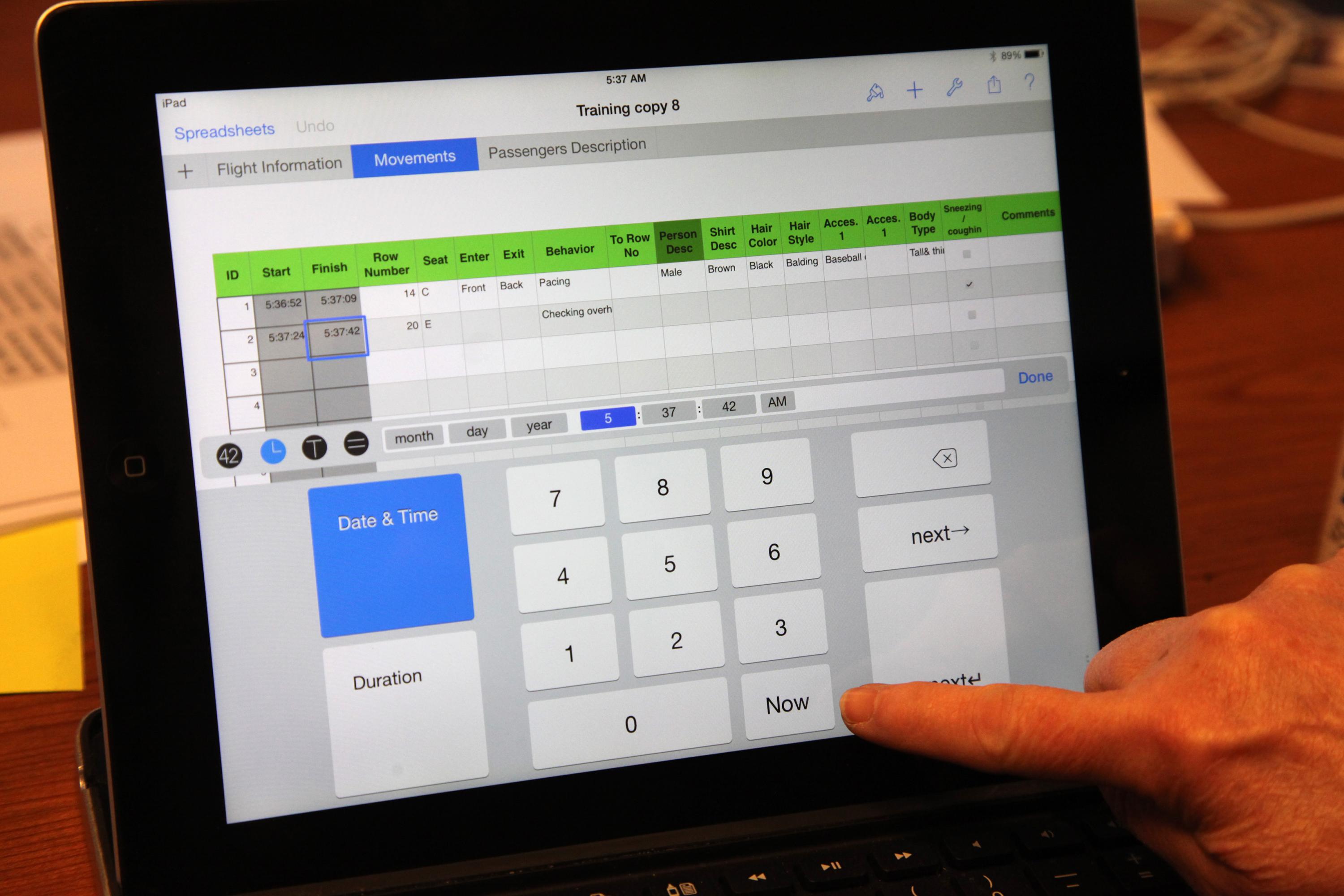 Students stationed in different zones throughout an aircraft recorded the movement of passengers using this iPad application. (Credit: Emory University)