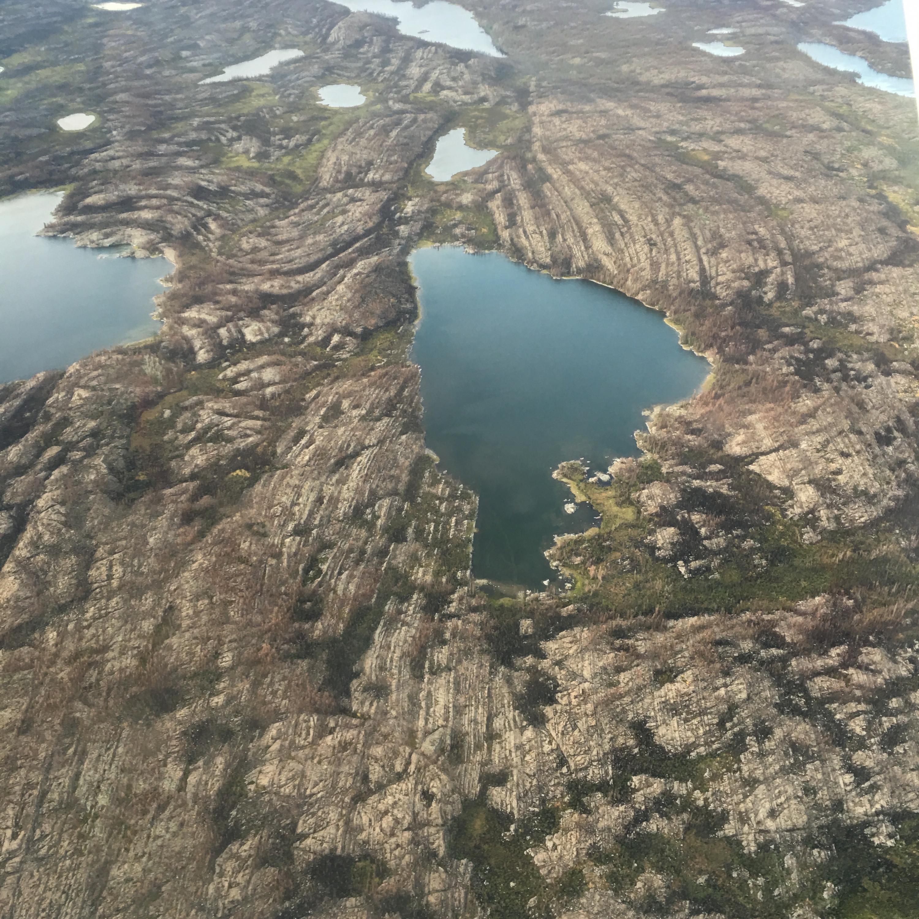 These 1.9 billion-year-old marine sediments are from the East Arm of the Great Slave Lake, Canada. Thousands of samples for this study were collected from the few places on Earth that have such remaining slivers of ancient seafloor. Credit: Georgia Tech / Yale - Reinhard / Planavsky