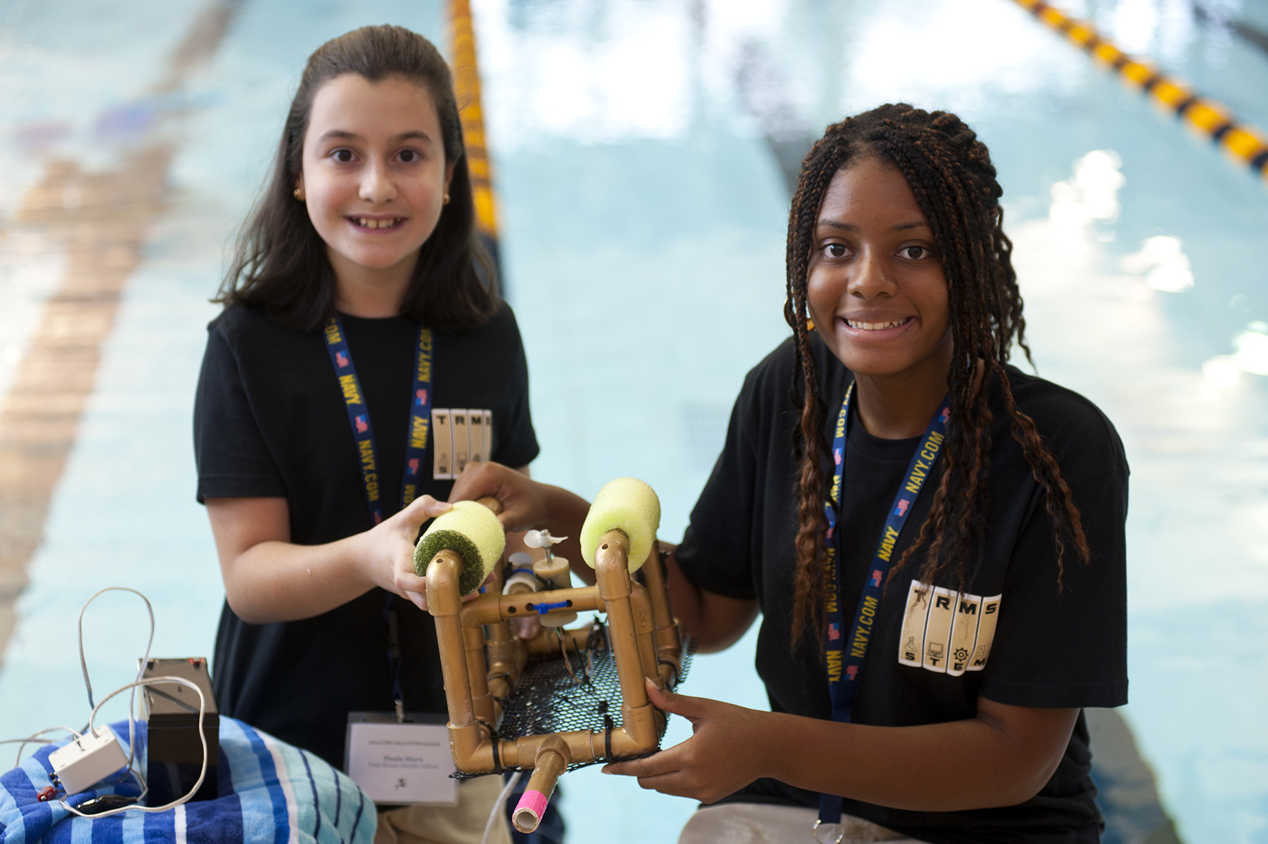 Student competitors work on their underwater remotely operated vehicle during the SeaPerch competition at the Georgia Tech McAuley Aquatic Center in 2015.