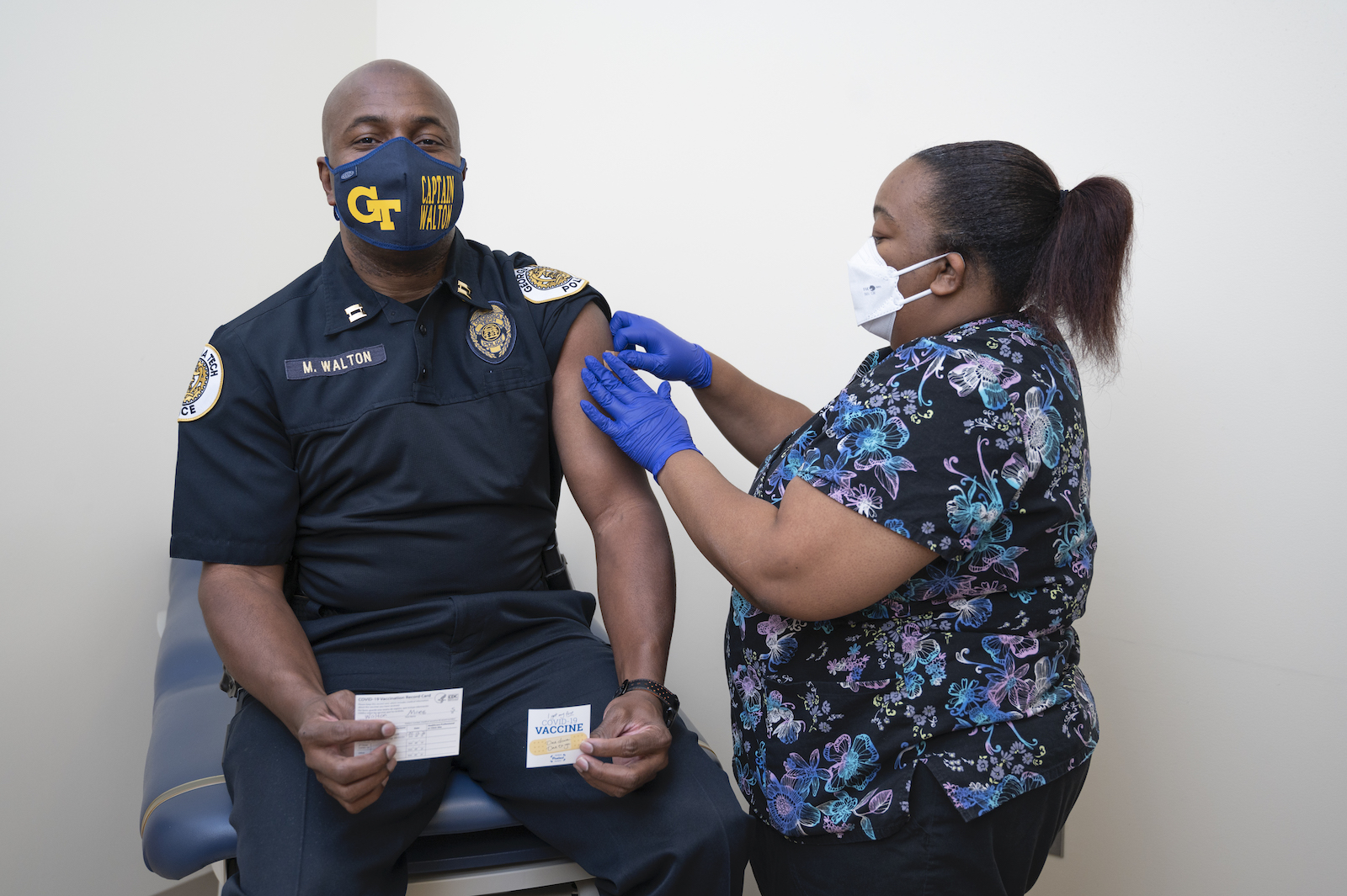 Captain Marcus Walton with GTPD was among the first to get the Covid-19 vaccine at Georgia Tech. Anndrea Terrell, certified medical assistant with Stamps Health Services, gave Walton the vaccine. (Photo by Christopher Moore)