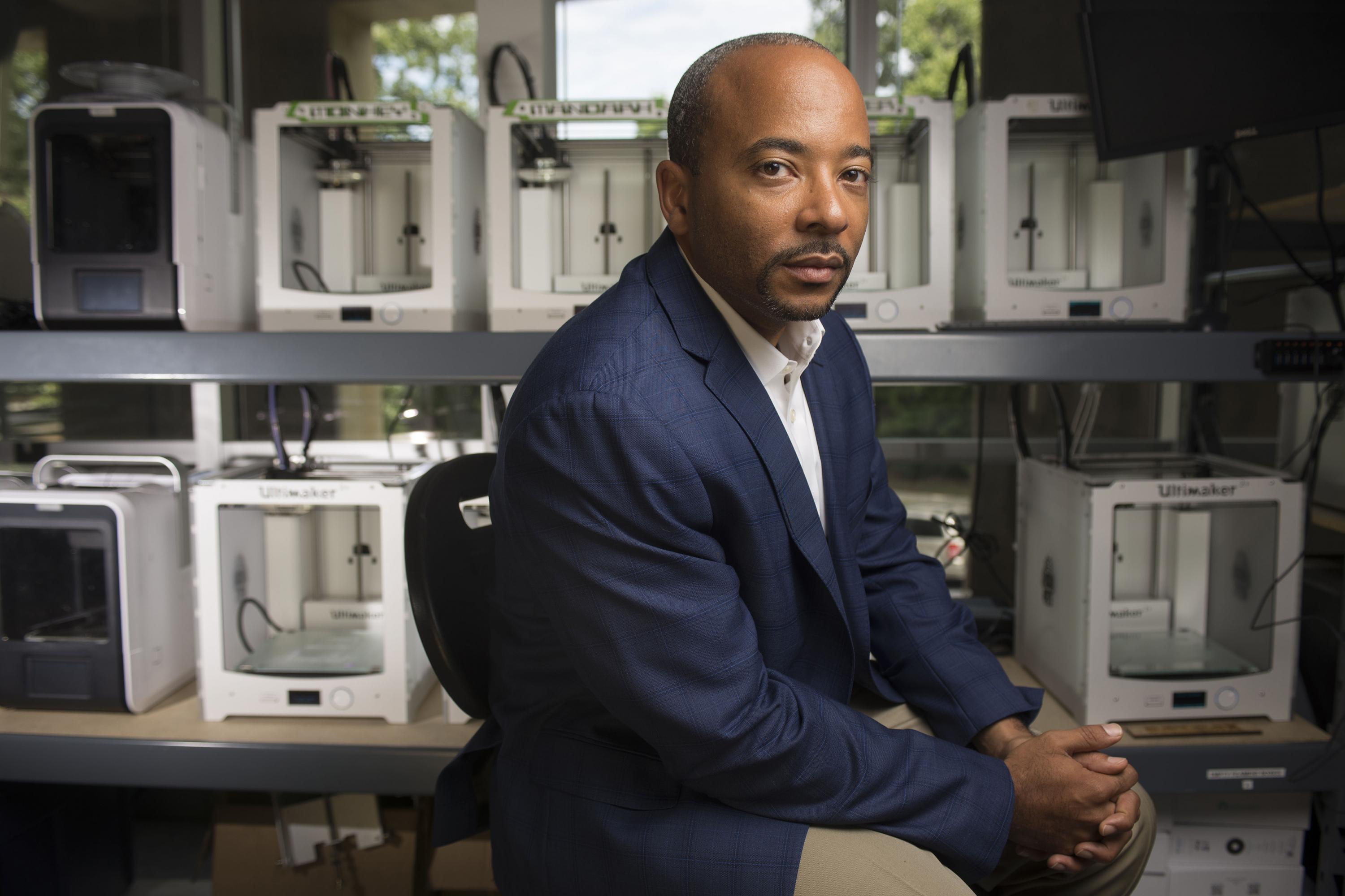 Raheem Beyah, the Motorola Foundation Professor and associate chair in Georgia Tech’s School of Electrical and Computer Engineering, is shown in a 3-D printing lab at the Woodruff School of Mechanical Engineering. (Credit: Christopher Moore, Georgia Tech)