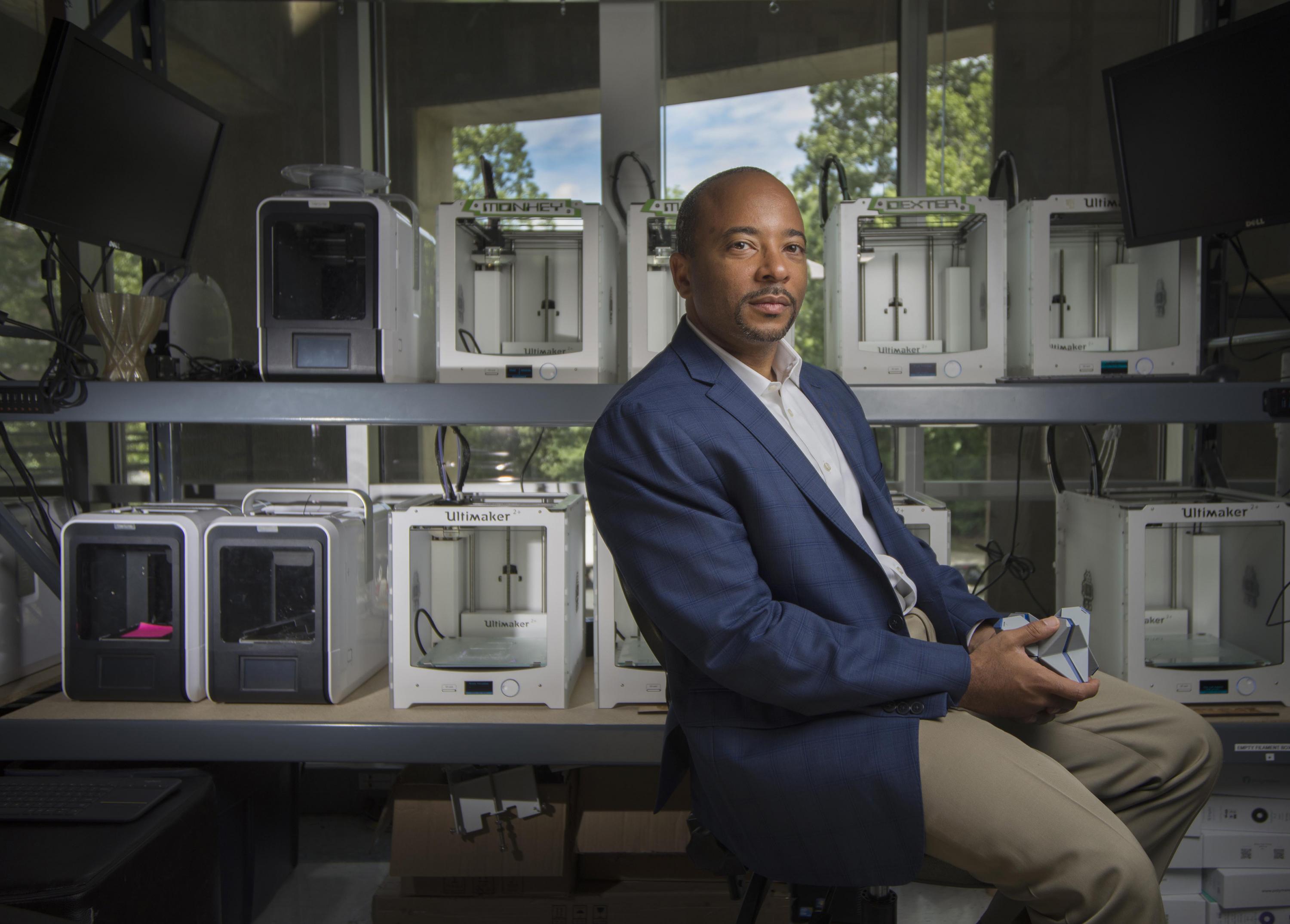 Raheem Beyah, the Motorola Foundation Professor and associate chair in Georgia Tech’s School of Electrical and Computer Engineering, is shown in a 3-D printing lab at the Woodruff School of Mechanical Engineering. (Credit: Christopher Moore, Georgia Tech)
