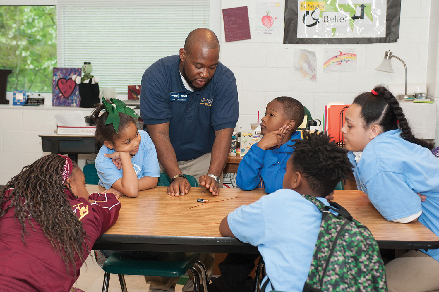 Sirocus Barnes gives instruction in an extracurricular science and technology class at Drew Charter School. Sirocus Barnes gives instruction in an extracurricular science and technology class at Drew Charter School.