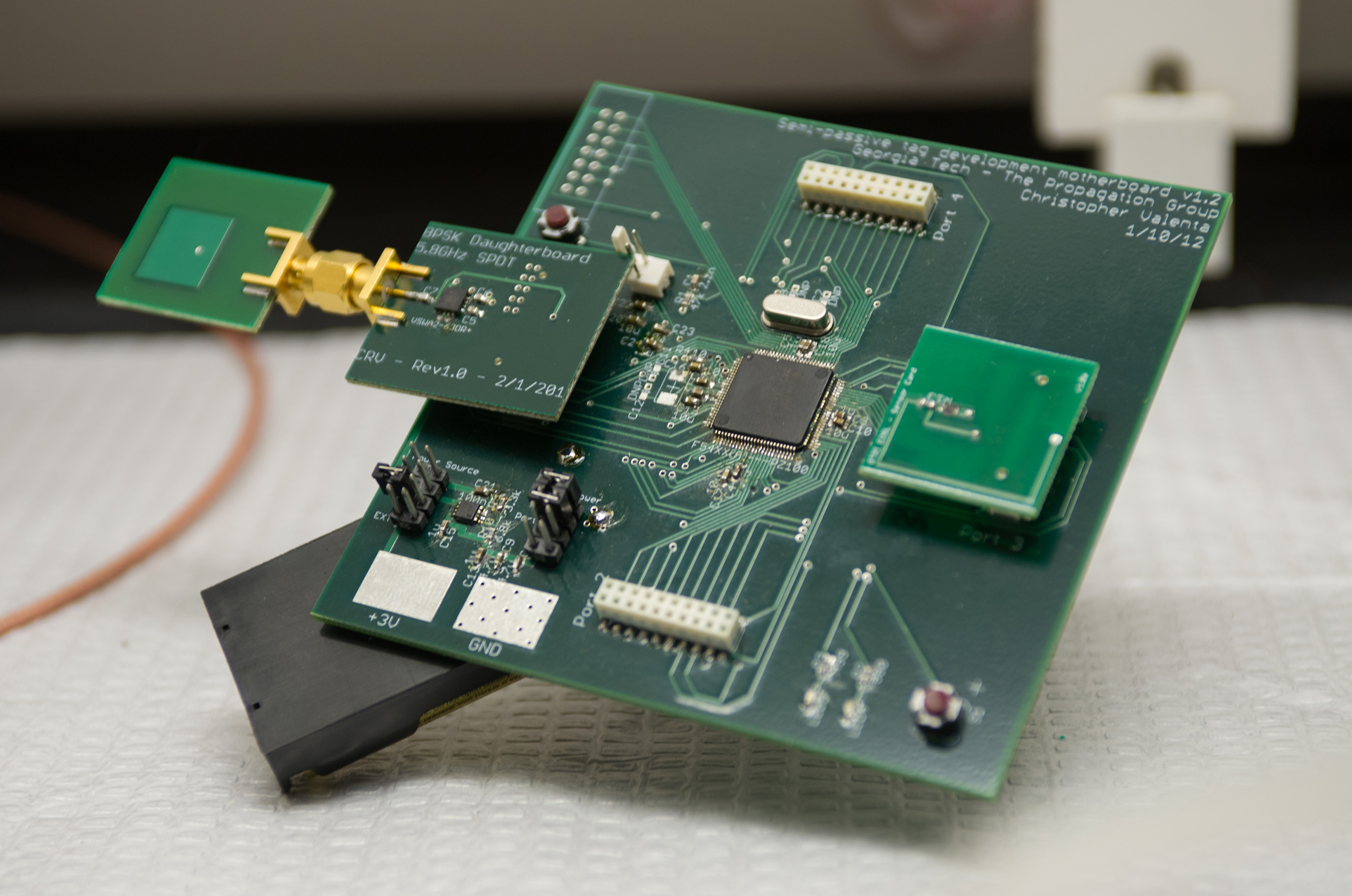 The RFID Enabled Sensing Testbed (R.E.S.T.) shown here allows rapid prototyping of RFID-enabled sensors and RF technology. A carbon nanomaterial-based sensor board can be seen on the right, along with a 5.8 GHz two-state RF modulator. (Georgia Tech Photo: Rob Felt)