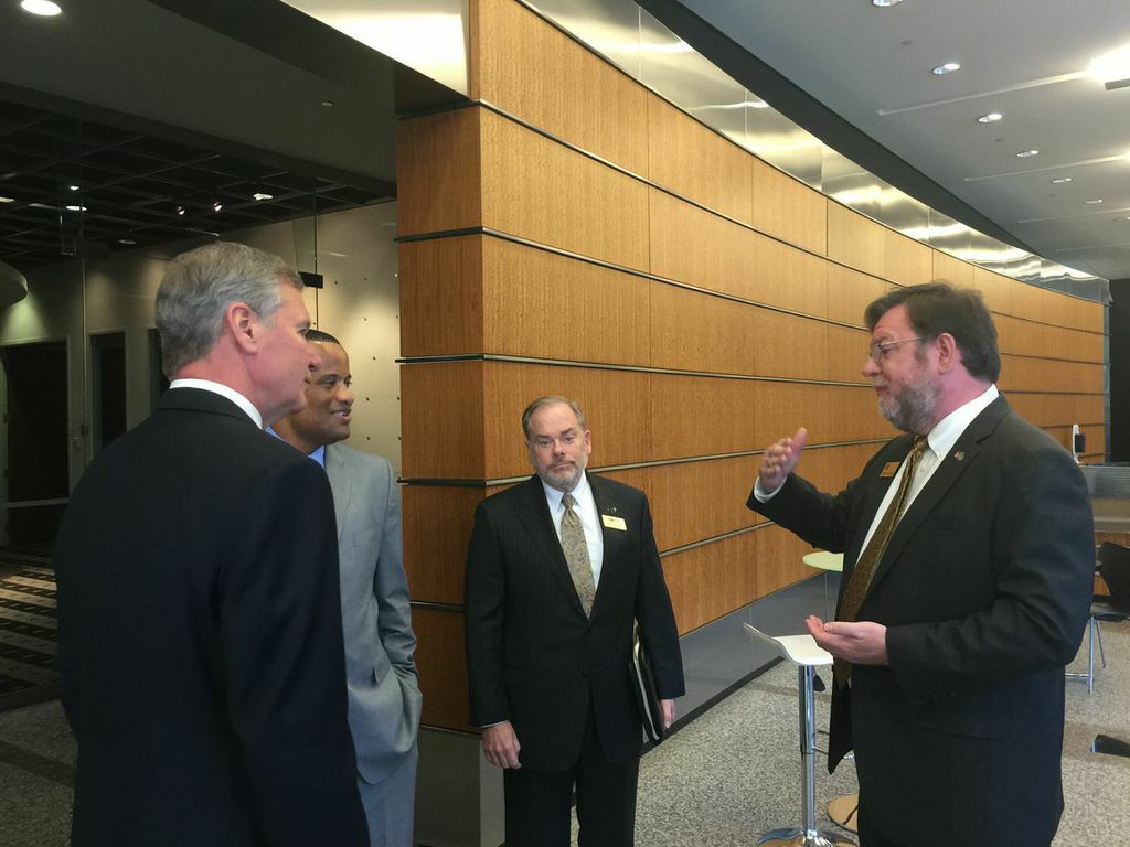 Stephen Fleming (right), vice president of Georgia Tech's Enterprise Innovation Institute, discusses the innovation ecosystem at Tech Square with Jay Williams, (second from left), the assistant secretary of commerce for economic development at the U.S. Department of Commerce. Williams, who was joined by Georgia Tech President G.P. "Bud" Peterson (left) and Steven Cross (center), executive vice president of research at Tech, visited the Institute to make an announcement about a $500,000 i6 Challenge grant th Stephen Fleming (right), vice president of Georgia Tech's Enterprise Innovation Institute, discusses the innovation ecosystem at Tech Square with Jay Williams, (second from left), the assistant secretary of commerce for economic development at the U.S. Department of Commerce. Williams, who was joined by Georgia Tech President G.P. "Bud" Peterson (left) and Steven Cross (center), executive vice president of research at Tech, visited the Institute to make an announcement about a $500,000 i6 Challenge grant th