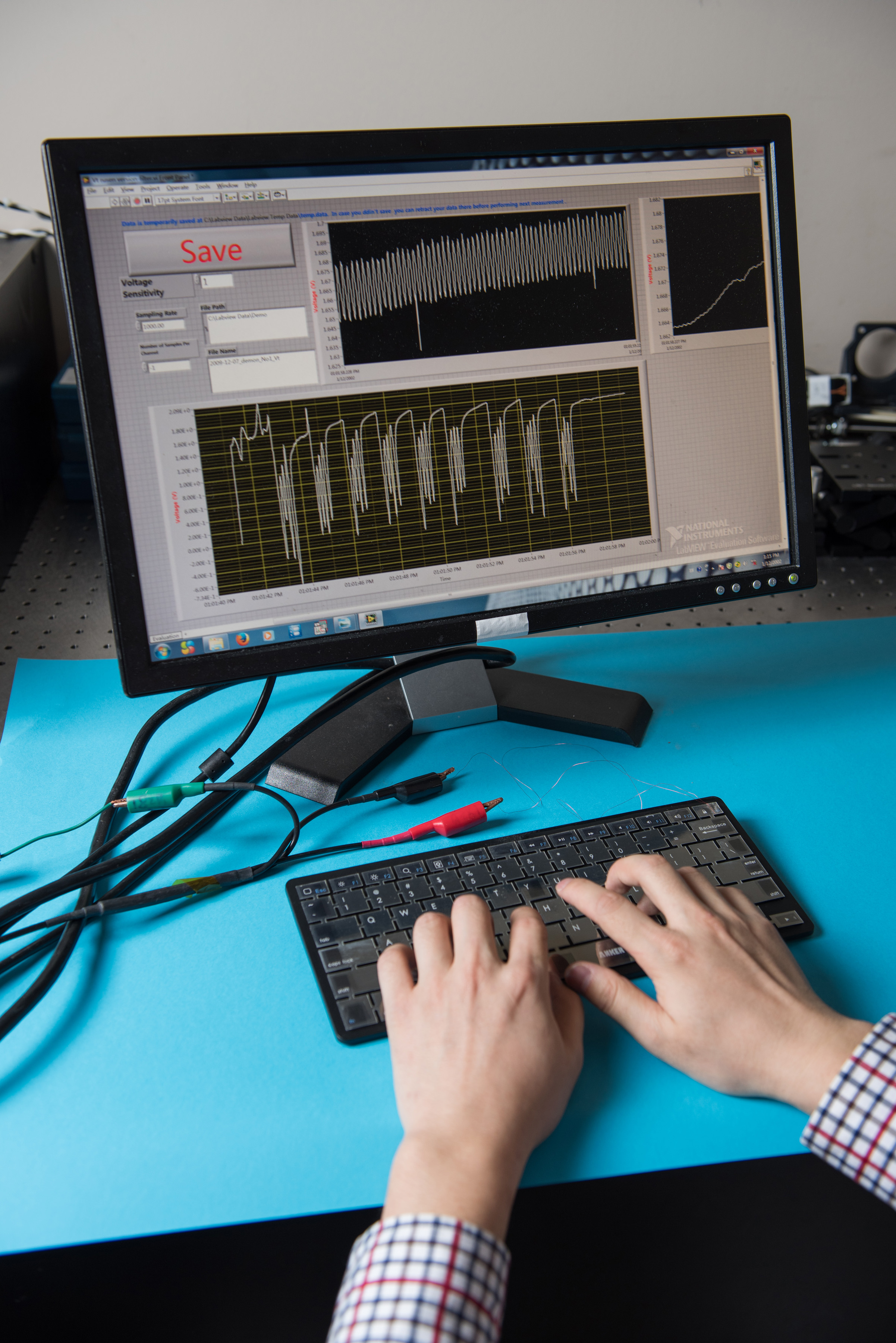 By analyzing such parameters as the force applied by key presses and the time interval between them, a new self-powered non-mechanical intelligent keyboard could provide a stronger layer of security for computer users. (Credit: Rob Felt)