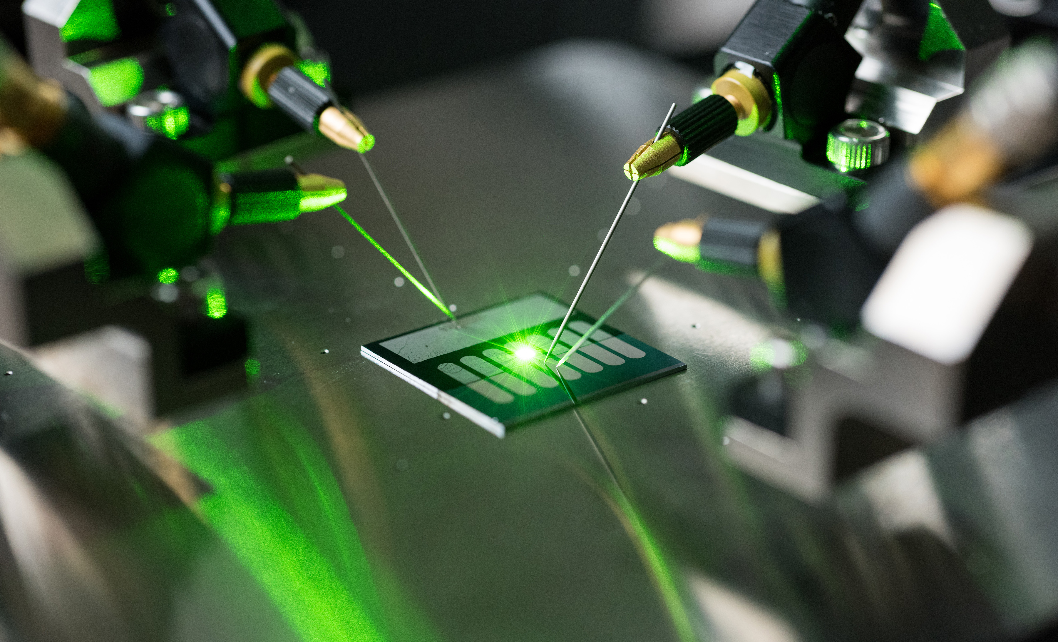 A carbon nanotube optical rectenna converts green laser light to electricity in the laboratory of Baratunde Cola at the Georgia Institute of Technology. (Credit: Rob Felt, Georgia Tech)