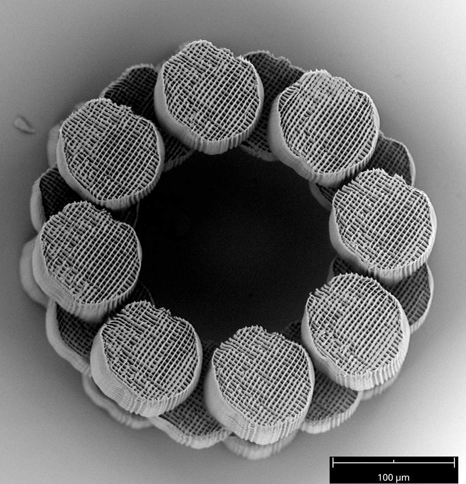 A stacked 3D ring structure generated by overlapping several projections in 3D space. Arbitrarily complex 3D structures can be generated through this depth-resolved nanoscale 3D printing technique. (Credit: Vu Nguyen and Sourabh Saha)