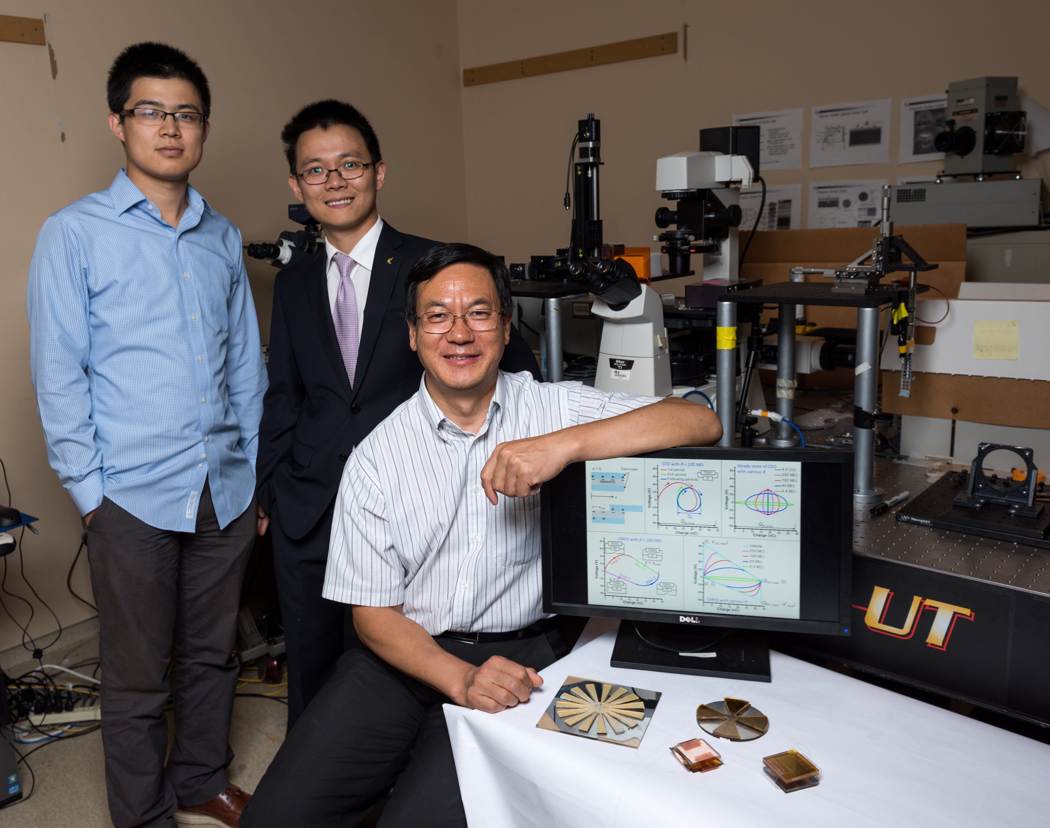 (Left to right) Georgia Tech graduate student Simiao Niu, postdoctoral fellow Yunlong Zi and Regents professor Zhong Lin Wang are shown with a selection of triboelectric nanogenerators. (Credit: Rob Felt, Georgia Tech) (Left to right) Georgia Tech graduate student Simiao Niu, postdoctoral fellow Yunlong Zi and Regents professor Zhong Lin Wang are shown with a selection of triboelectric nanogenerators. (Credit: Rob Felt, Georgia Tech)