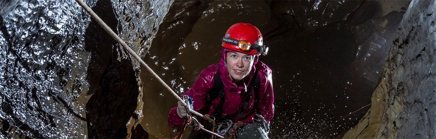 A Georgia Tech student caving on an ORGT expedition.
